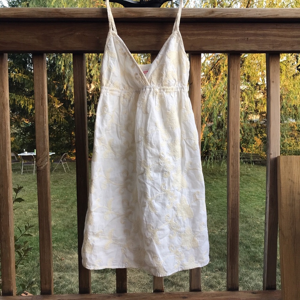 White/tan patterned floral sundress, size small.